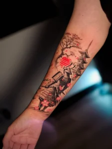 Tatuagem Samurai com templo e sol nascente no antebraço